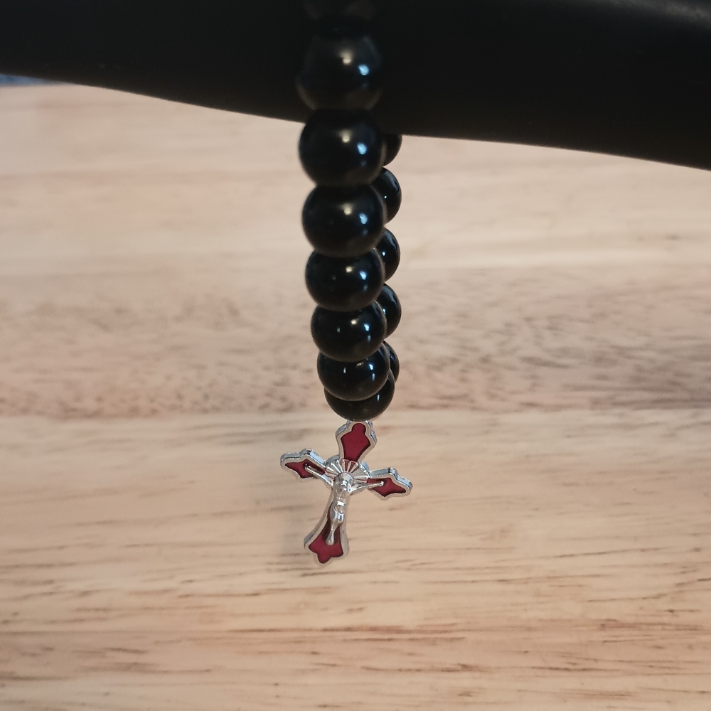 Black Beaded Bracelet with Red Cross Charm